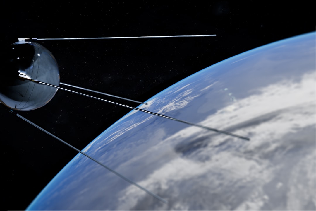 A Sputnik-style satellite in orbit above the curve of the Earth